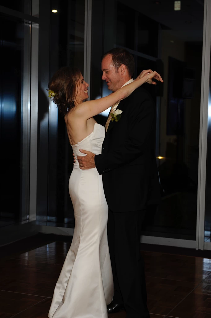Newlywed couple dancing during an Orlando wedding reception with Boomer Beats DJ Services